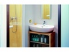 Раковина Roca Dama Senso Compacto 327519000 R угловая